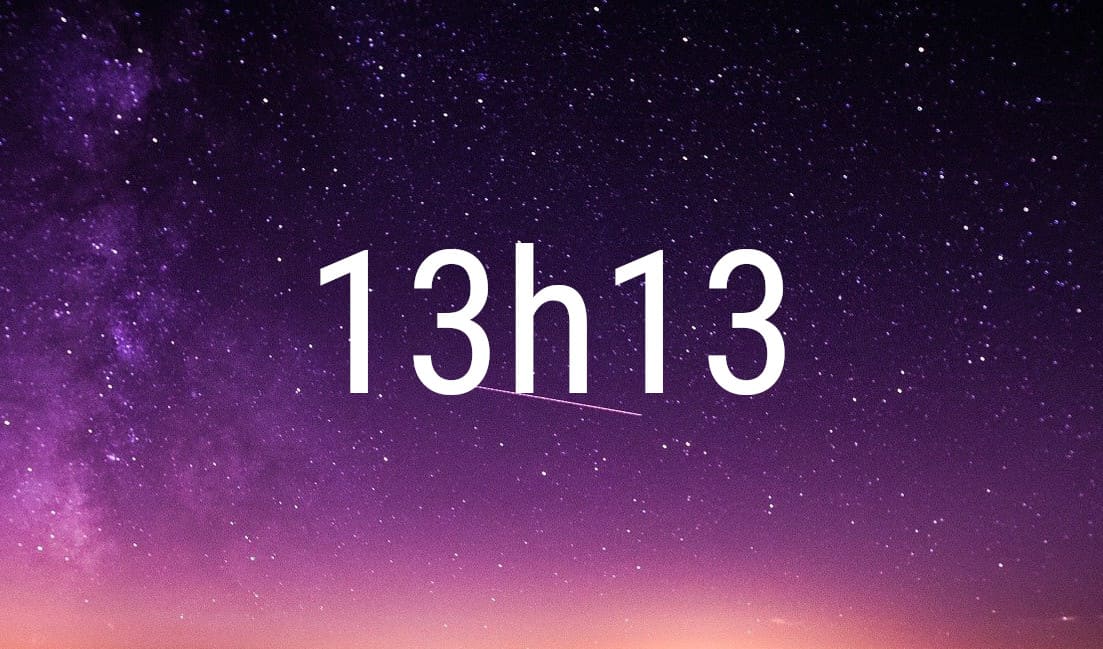 13:13 angel number in white digits on a starry purple night sky